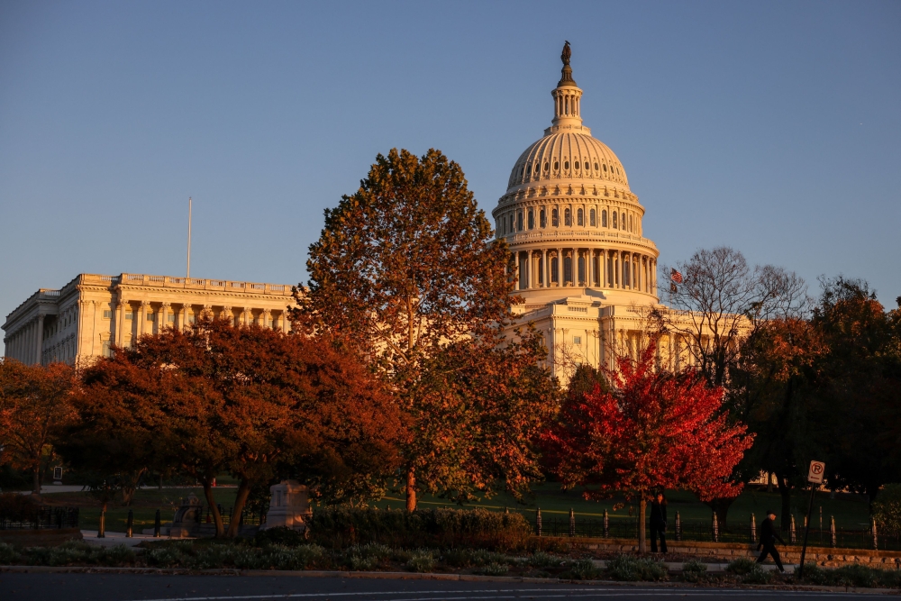 Autumn has arrived at the US Capitol building, weeks into the continuing US government shutdown October 23, 2025. — Reuters pic