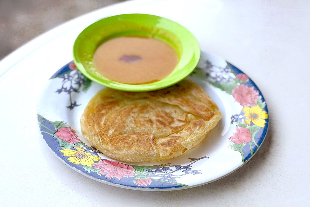 Roti Bom with dhal and ‘sambal’. — Picture by CK Lim