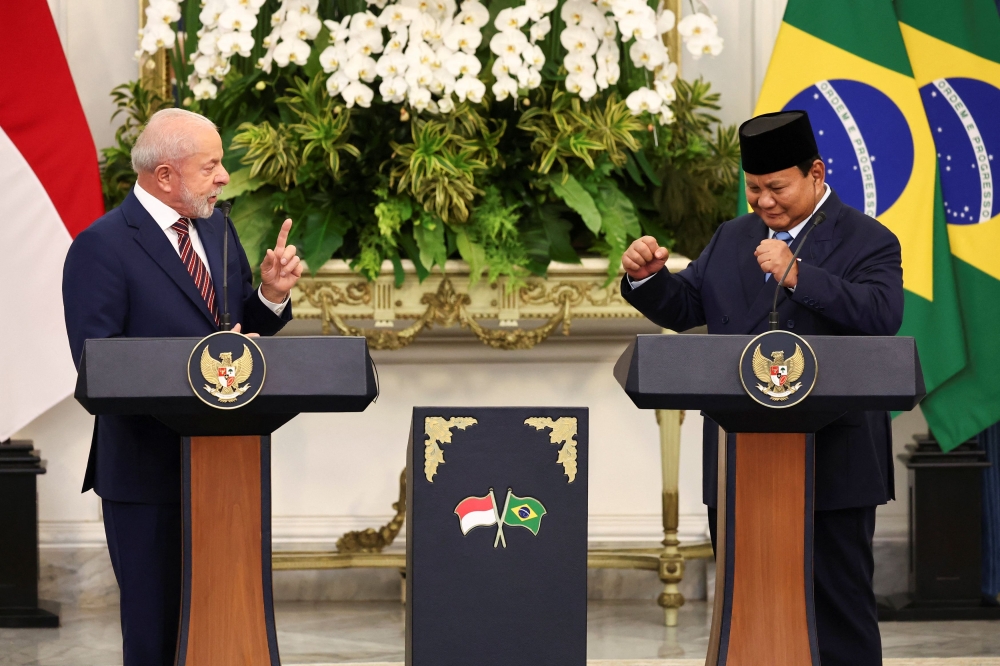President Prabowo Subianto and Brazilian President Luiz Inacio Lula da Silva during a joint press conference at Merdeka Palace in Jakarta, Indonesia, October 23, 2025. — Reuters pic