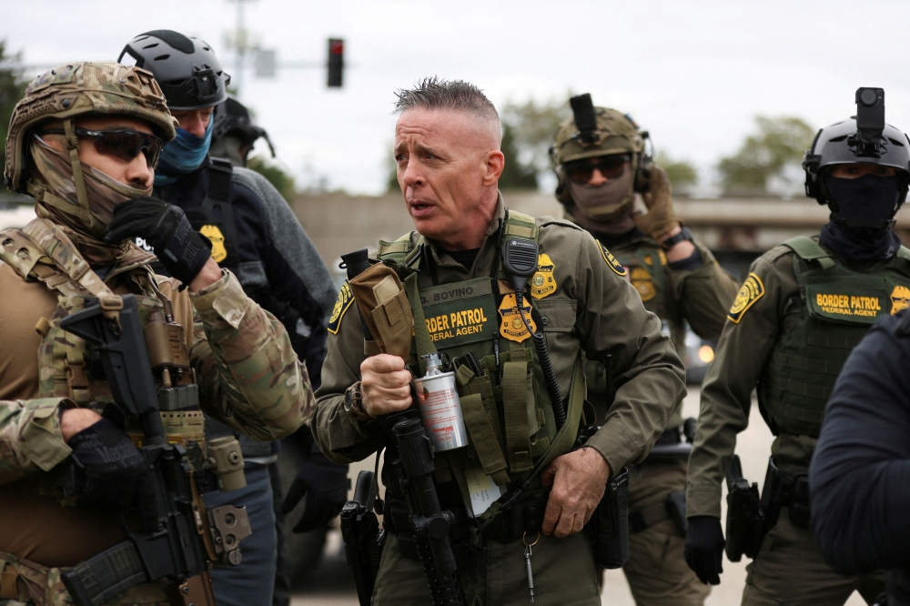 USBP Chief Patrol Agent of the El Centro sector, Greg Bovino, speaks with federal agents in the Cicero neighbourhood during an immigration raid, after US President Donald Trump ordered increased federal law enforcement presence to assist in crime prevention, in Chicago, Illinois October 22, 2025. — Reuters pic