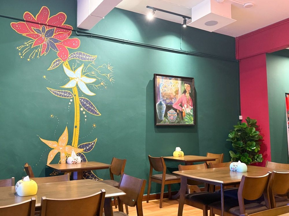 Peranakan themed motifs and artwork gives the dining space much character. — Picture by Lee Khang Yi