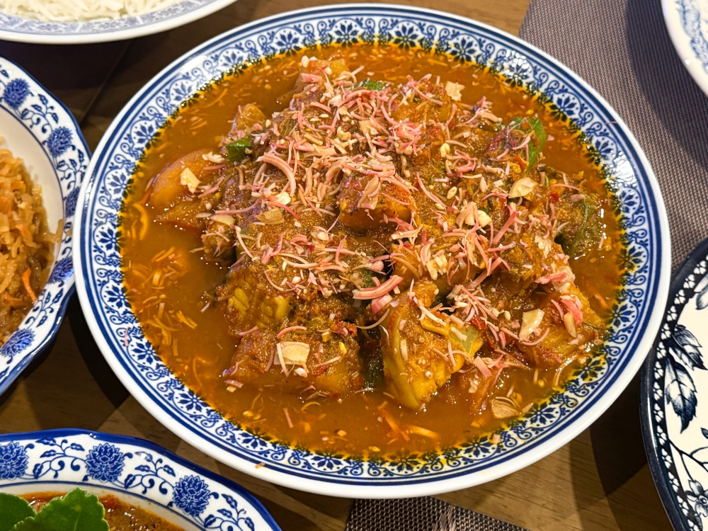 Gulai Tumis Stingray takes on a lighter flavour with the use of herbs and includes perfectly cooked stingray fish with soft, slippery flesh. — Picture by Lee Khang Yi