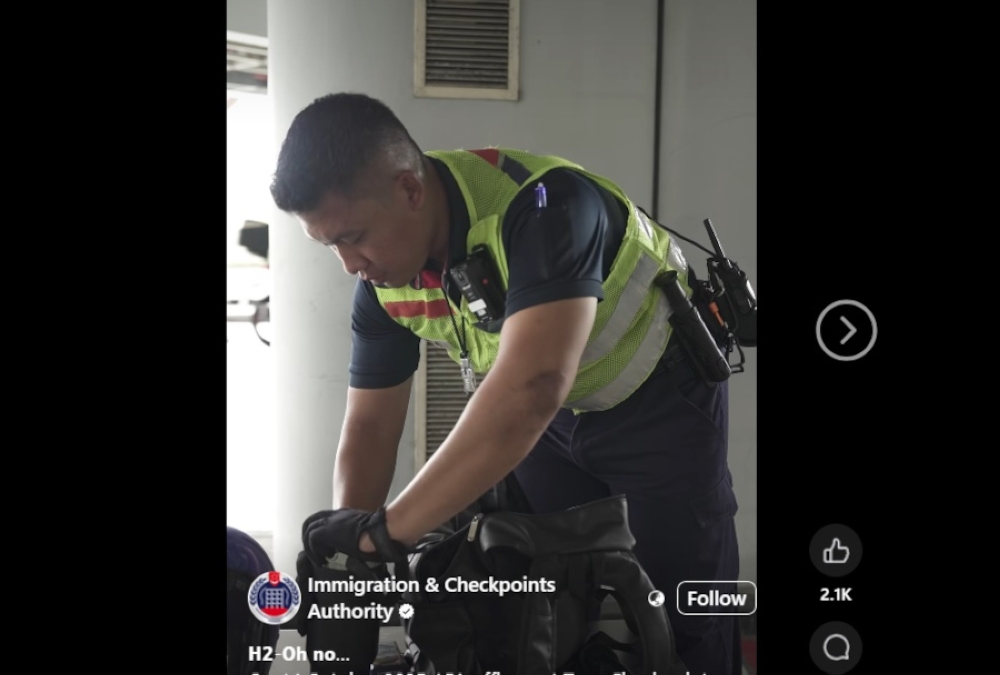 According to a Facebook post, ICA officers stopped the man for further inspection on October 14 after he claimed he had nothing to declare. — Screengrab from Facebook/Immigration & Checkpoints Authority