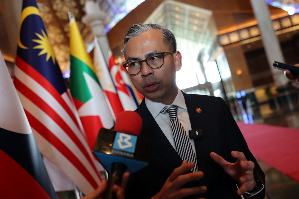 Minister of Communications Datuk Fahmi Fadzil speaks to the media after accompanying Timor-Leste Prime Minister Kay Rala Xanana Gusmão to the Bunga Raya Complex, Kuala Lumpur International Airport (KLIA) in Sepang on October 29, 2025. — Bernama pic