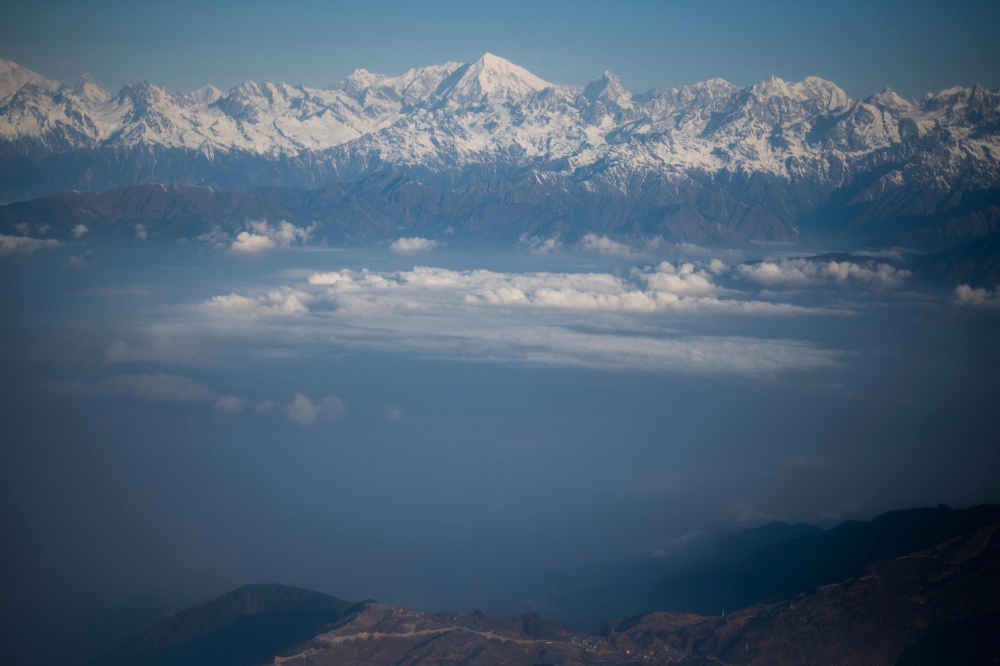 Visited by thousands of trekkers and climbers, the region around Mount Everest has been blanketed by snow since Monday as a cyclone from the Bay of Bengal churned across India, ushering in a second bout of severe snowfall in the Himalayas this month. — AFP pic