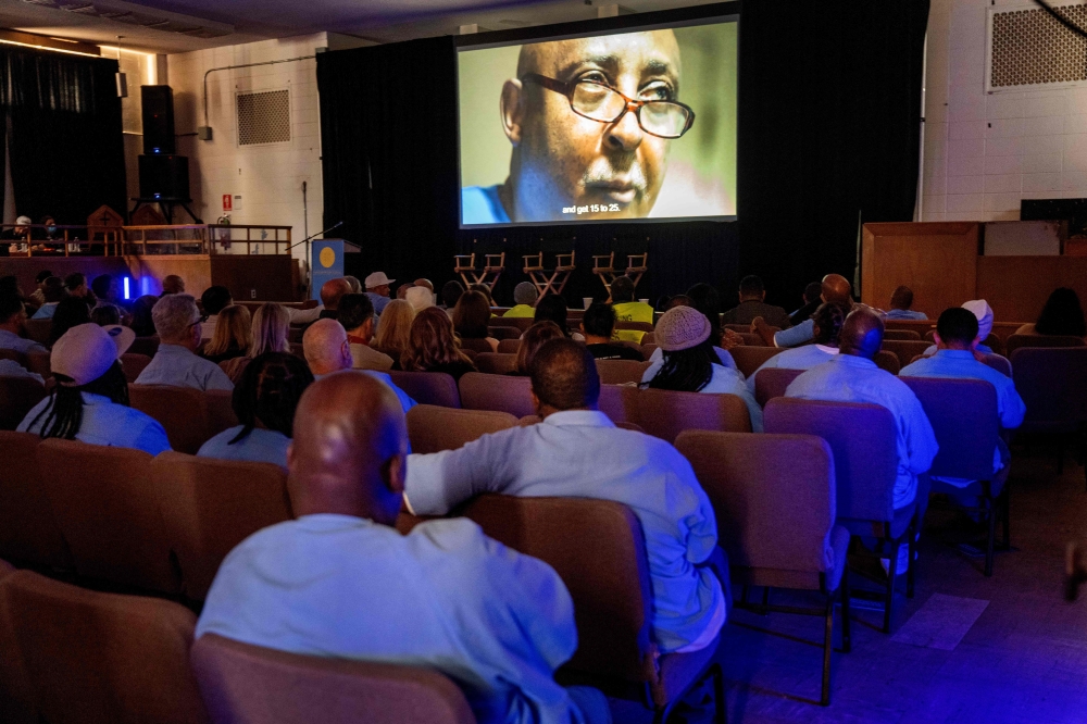 Dressed in prison blues, inmates watch a screening on day two of the San Quentin Film Festival at San Quentin Rehabilitation Center on October 24, 2025, in San Quentin, California. — AFP pic


