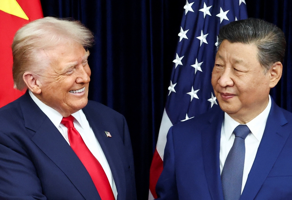 Trump praises Xi as ‘tough negotiator’ as US and China move to cool trade fight