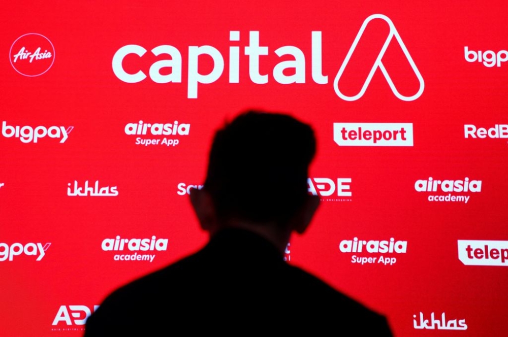 Capital A Bhd has completed the disposal of its airline operations to AirAsia X Bhd, with CEO Tan Sri Tony Fernandes calling it the ‘final chapter’ in the group’s aviation restructuring and the start of a new digital-focused journey. — Reuters pic