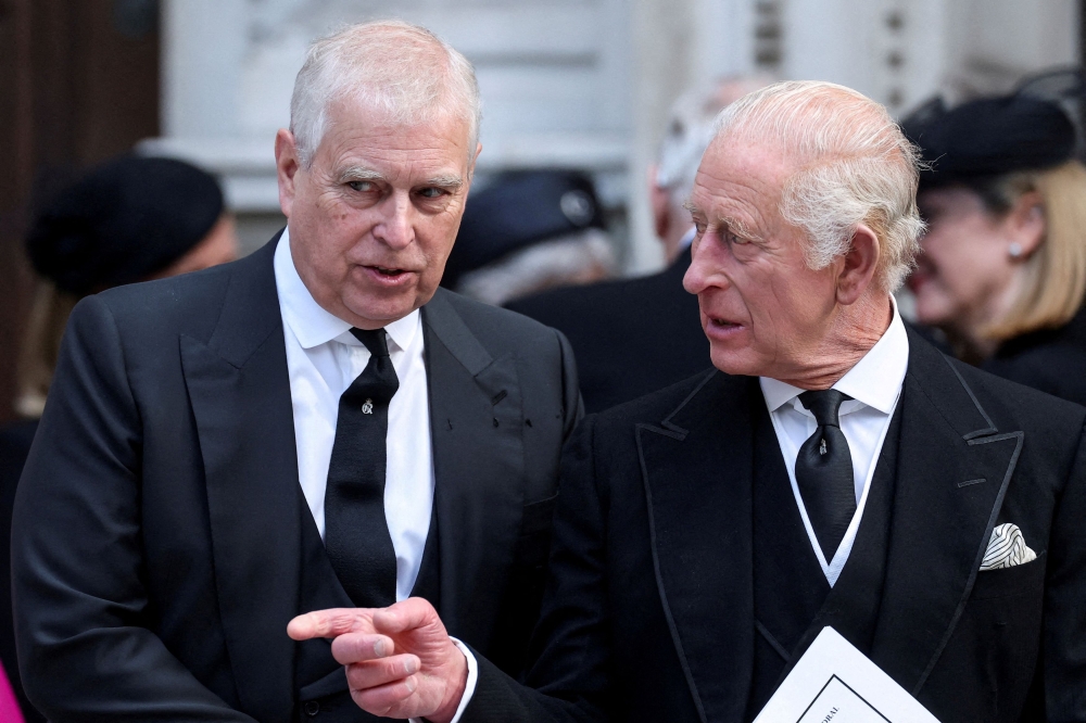Britain’s Prince Andrew speaks with King Charles as they leave Westminster Cathedral at the end of the Requiem Mass, on the day of the funeral of Britain’s Katharine, Duchess of Kent, in London September 16, 2025. — Reuters pic