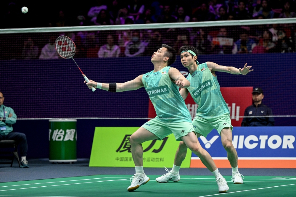 National men’s doubles shuttlers Aaron Chia-Soh Wooi Yik took just 38 minutes to defeat the Czech Republic’s Jiri Kral-Ondrej Kral 21-9, 22-20. — AFP pic
