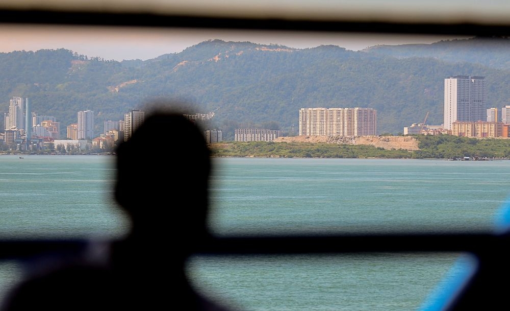 A view of the Jelutong Landfill Site from a ferry in George Town February 21, 2020. — Picture by Sayuti Zainudin
