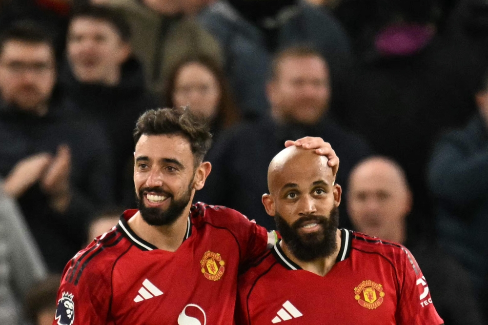 Manchester United’s Cameroonian midfielder #19 Bryan Mbeumo with Portuguese midfielder #08 Bruno Fernandes. — AFP pic