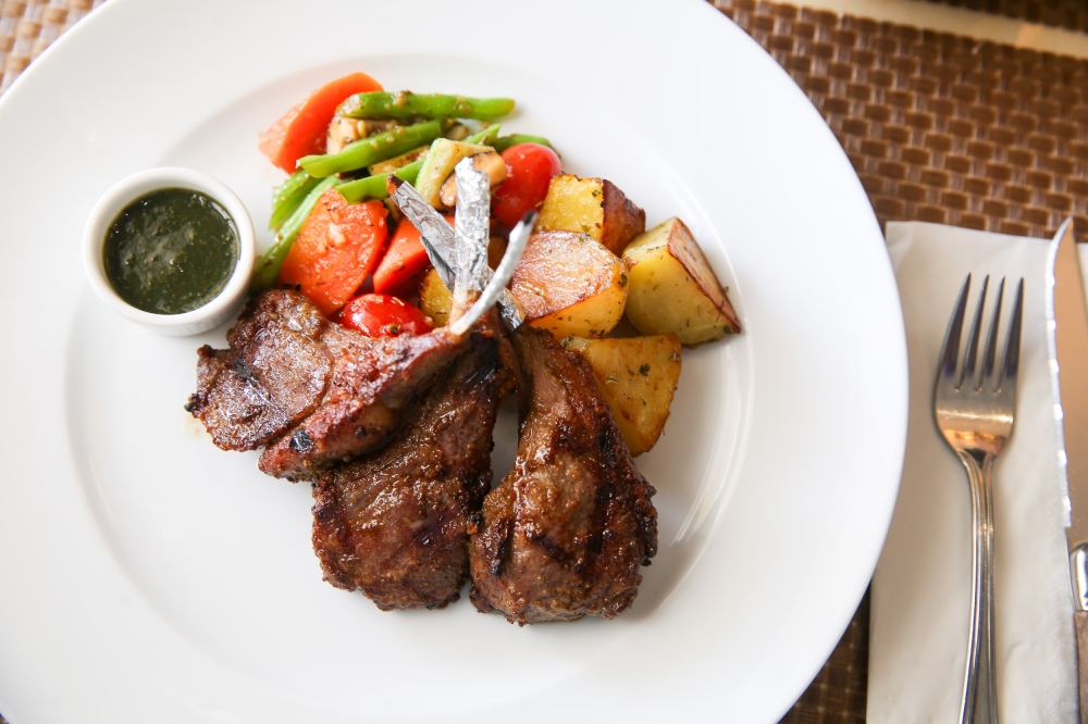 Not a fan of beef? There's juicy New Zealand lamb cutlets without any gamey flavour to relish with roasted potatoes and sautéed vegetables. — Picture by Choo Choy May