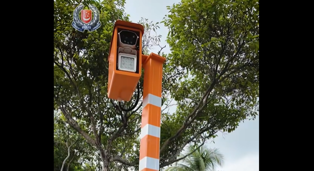 Singapore’s traffic police have begun testing new cameras designed to detect traffic offences such as illegal U-turns, crossing double white lines, and stopping in yellow boxes. — Screengrab of video via Facebook/Singapore Police Force