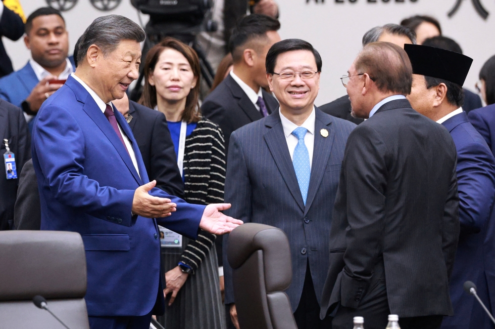 China's President Xi Jinping spoke with Malaysian Prime Minister Datuk Seri Anwar Ibrahim and Indonesia's President Prabowo Subianto while Hong Kong's Chief Executive John Lee observed during the Asia-Pacific Economic Cooperation (Apec) summit in Gyeongju, South Korea, on November 1, 2025. — Reuters pic