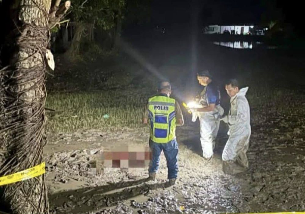 The victim's body was found with his severed head about a metre from his body with slash wounds also found on the rest of his body.— Picture via social media