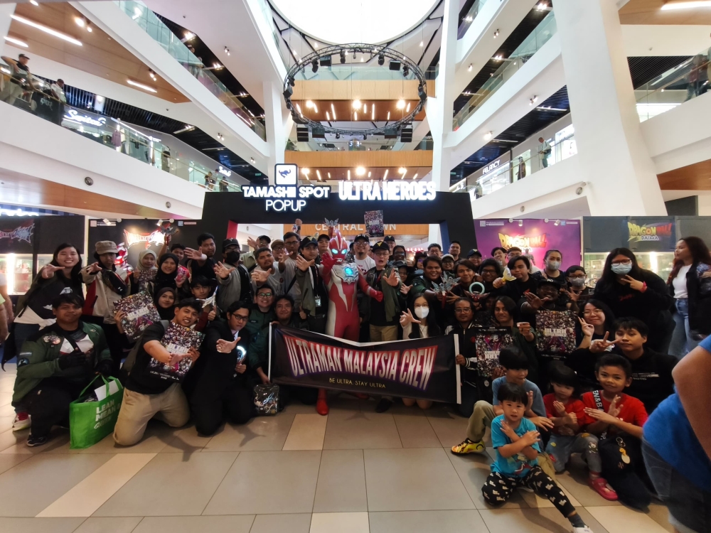 The UMCrew poses with Ultraman Omega at today’s Ultra Assemble event at My Town Shopping Centre. — Picture courtesy of UMCrew