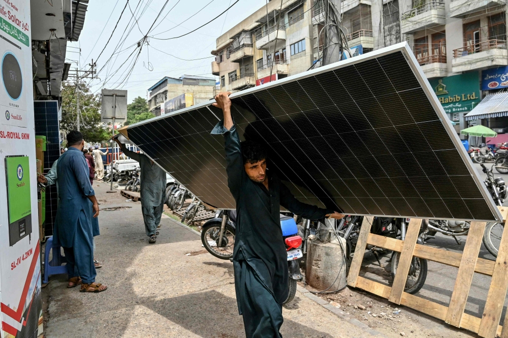 Why global clothing giants are investing in solar panels for tiny factories