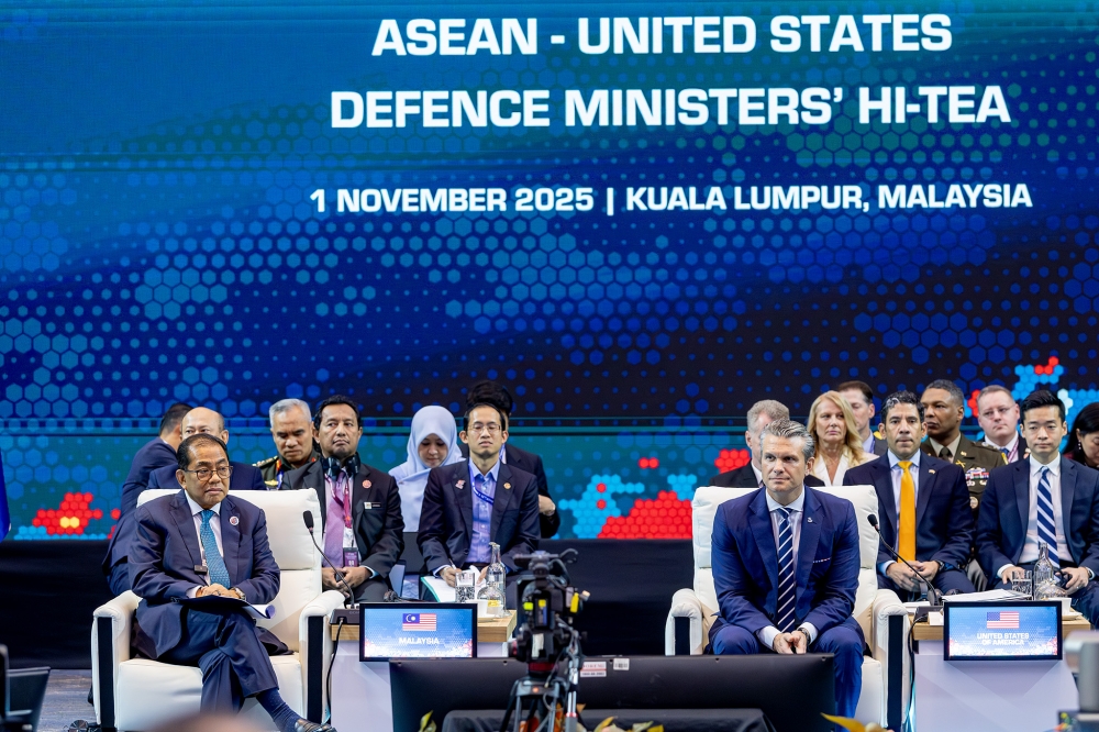 Datuk Seri Mohamed Khaled Nordin meets with US Defense Secretary Pete Hegseth at the Asean- US Defence Ministers Hi-Tea on the sidelines of the 12th Asean Defence Ministers Meeting-Plus (ADMM-Plus) at KLCC on November 1, 2025. — Picture by Firdaus Latif