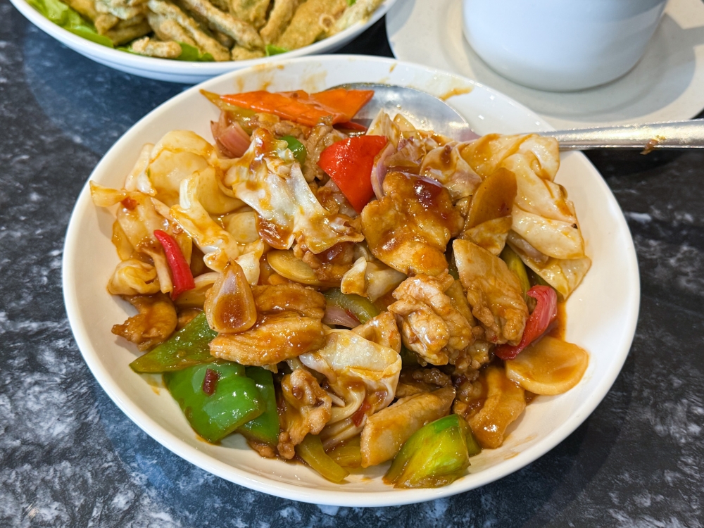 Sauteed Pork Belly is more like a mixed vegetables and pork belly dish, combined with a tangy sauce. — Picture by Lee Khang Yi