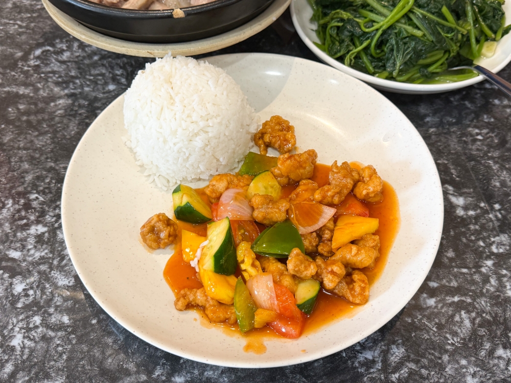 Sweet and Sour Pork with rice can also be ordered if you’re dining solo here. — Picture by Lee Khang Yi 