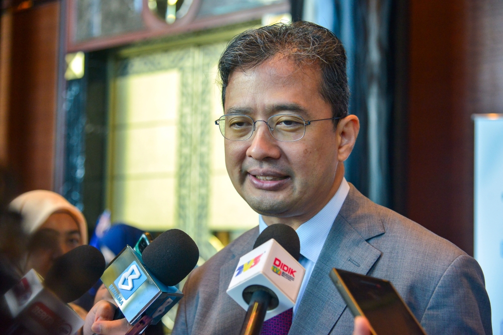 Treasury secretary-general Datuk Johan Mahmood Merican speaks to media during the Business Conference in 2026 National Budget, SST and International Trade Updates at Sunway Pyramid Hotel November 3, 2025. — Bernama pic