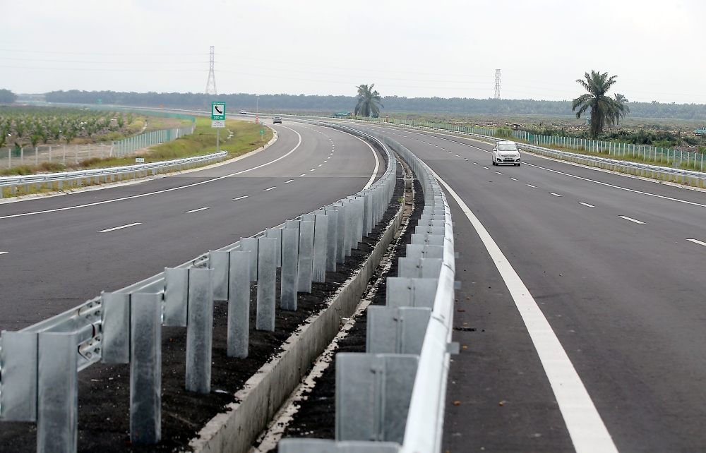 The WCE is a key national infrastructure project spanning 233 kilometres, connecting Banting, Selangor to Taiping, Perak, and serving as an alternative route to the North-South Expressway (PLUS) to help reduce congestion. — Picture by Farhan Najib