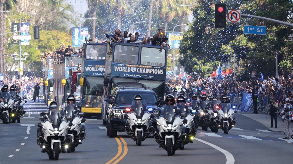 The Los Angeles Dodgers celebrate on buses during the Dodgers 2025 World Series Championship parade on November 03, 2025 in Los Angeles, California. — Getty Images via AFP pic