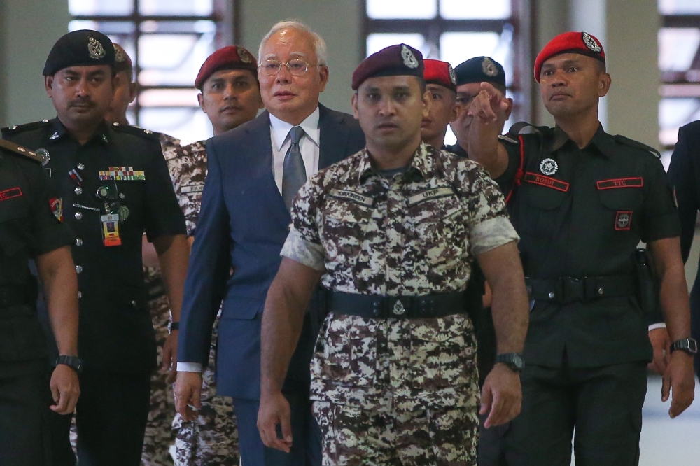 Former prime minister Datuk Seri Najib Razak is brought to stand trial at the Kuala Lumpur Court Complex on June 20, 2025. — Picture by Yusof Mat Isa