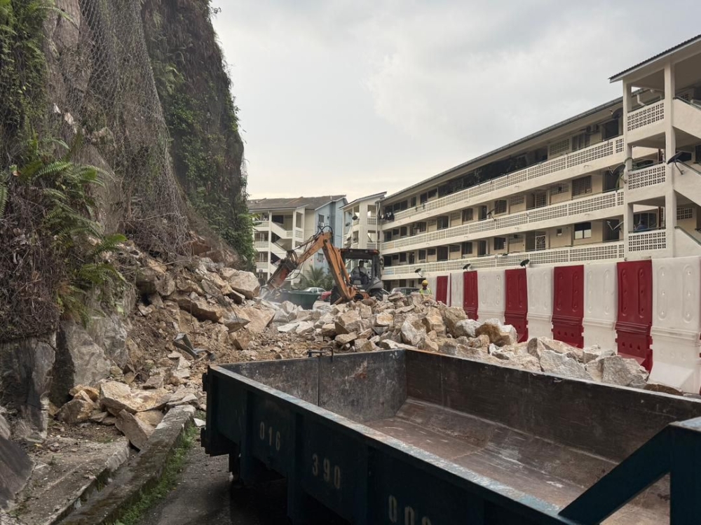 A collapsed section is seen near Mutiara Court Apartments in Taman Bukit Permai, Ampang. — MPAJ pic