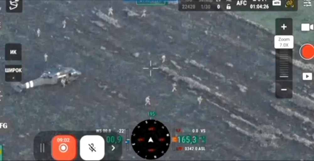 A still image taken from a video released October 31 and shared with Reuters by a Ukrainian military source was said to show a helicopter and troops deployed in the eastern city of Pokrovsk, Ukraine. — Ukrainian Military source pic via Reuters 