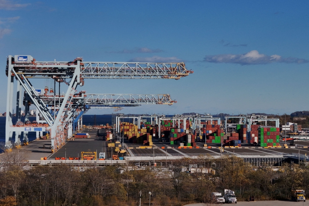 A drone view shows shipping containers stacked at the Conley Container Terminal, as the US Supreme Court is set to consider the legality of US President Donald Trump’s global tariffs, in Boston, Massachusetts November 4, 2025. — Reuters pic 