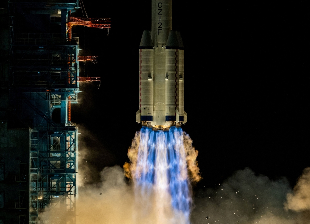 A Long March 2F rocket carrying the Shenzhou-21 spacecraft with astronauts Zhang Hongzhang, Zhang Lu, and Wu Fei blasts off to China’s Tiangong space station from the launchpad at the Jiuquan Satellite Launch Center, near Jiuquan, Gansu province, China October 31, 2025.