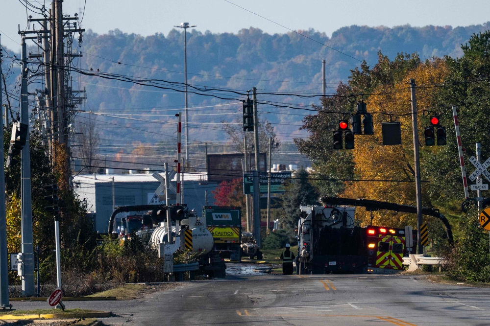 Emergency personnel block a road near Muhammad Ali International Airport in Louisville, Kentucky, on Nov 5, 2025, after a UPS cargo plane crash. — AFP pic
