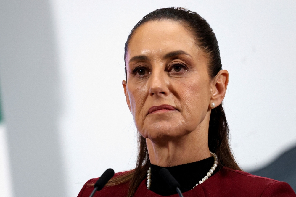 In this file photo taken on June 25, 2025, Mexico’s President Claudia Sheinbaum listens to a question during a daily news conference at the National Palace in Mexico City. — Reuters pic