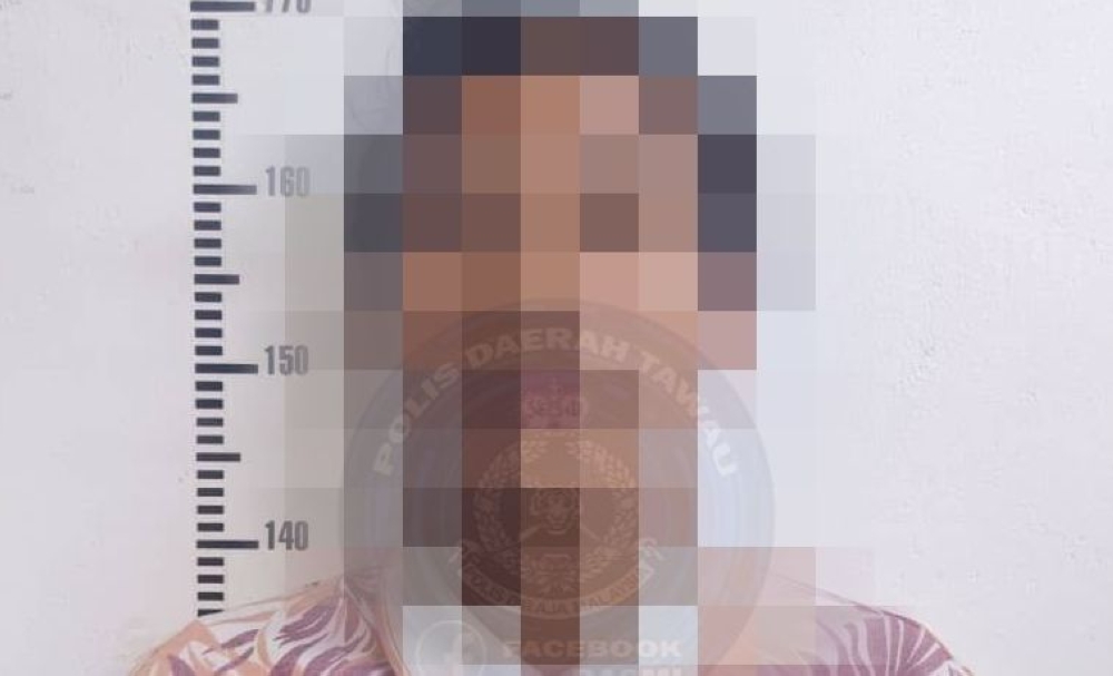 A mugshot of the suspect. — PDRM Tawau pic