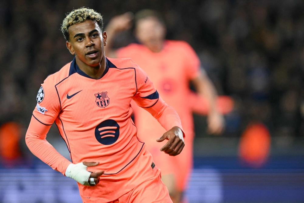 Barcelona's Spanish forward Lamine Yamal celebrates scoring the equalizing 2-2 goal. — AFP pic