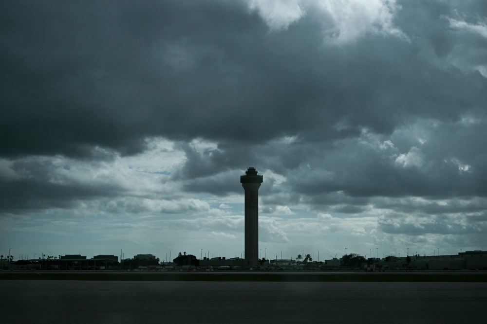 A control tower is seen at Miami International Airport after US President Donald Trump arrived on Air Force One on his way to speak at the American Business Forum in Miami on November 5, 2025. — AFP pic