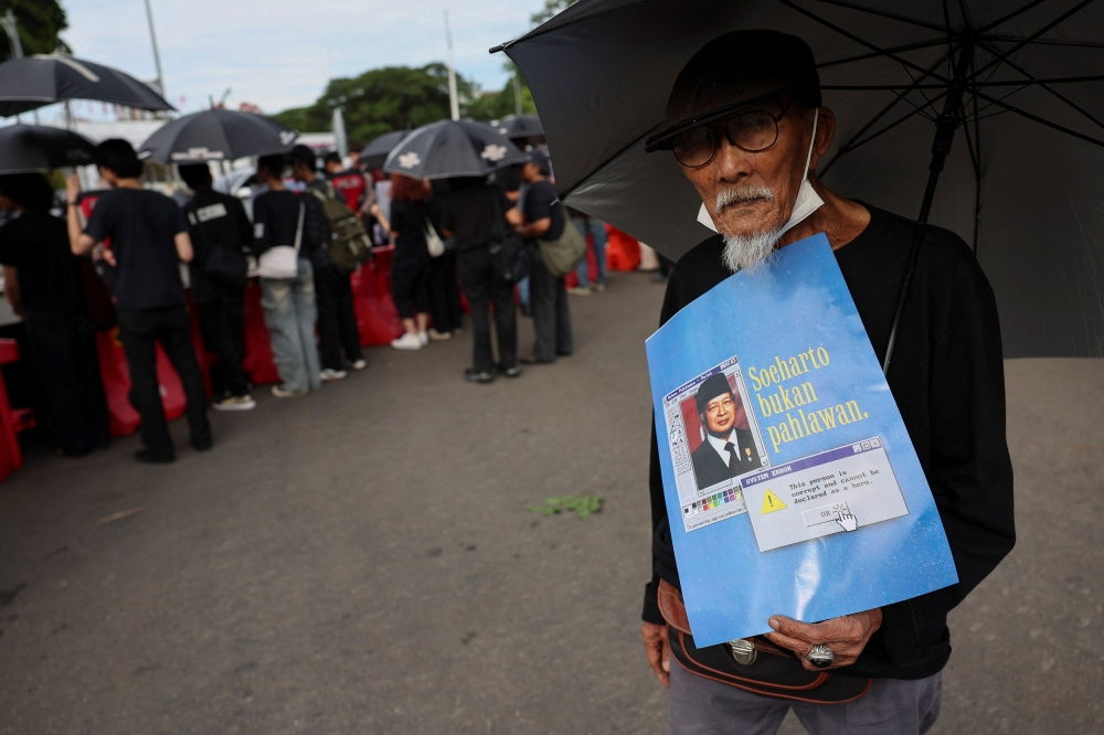 Indonesian activists rally in Jakarta against Suharto’s national hero bid