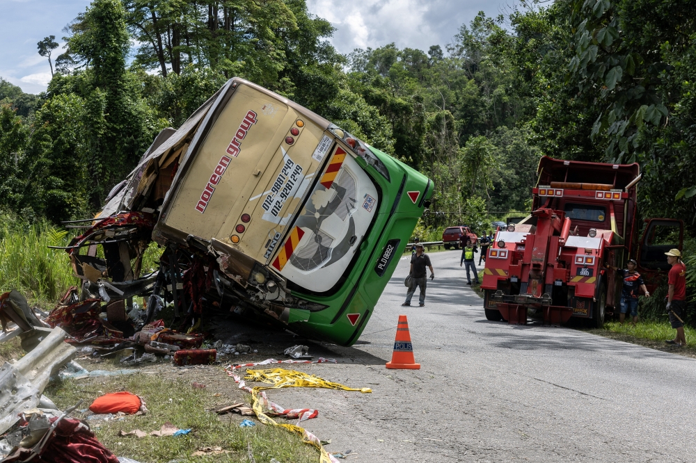 On June 9, fifteen Universiti Pendidikan Sultan Idris (UPSI) students were killed and 33 others injured when a chartered bus plunged off a hillside near KM53 of the East–West Highway. — Bernama pic