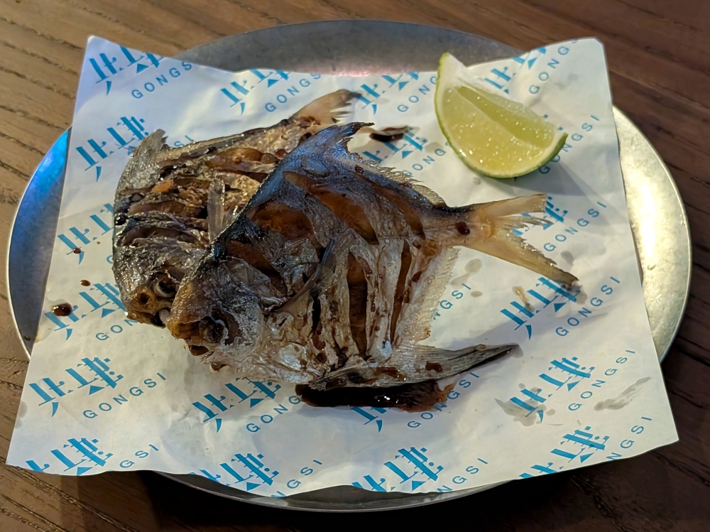 Deep-fried baby pomfret is easy to eat, bones and all. — Picture by Ethan Lau