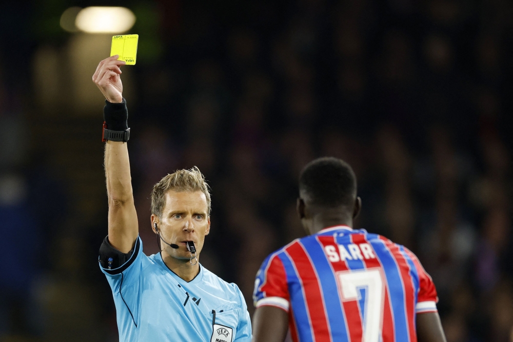 Crystal Palace’s Ismaila Sarr is shown a yellow card by referee Daniele Chiffi for simulation during a Uefa Conference League match against AZ Alkmaar at Selhurst Park, London, November 6, 2025. Turkiye has detained 18 people, including referees, in a match-fixing and betting probe. — Action Images pic via Reuters 