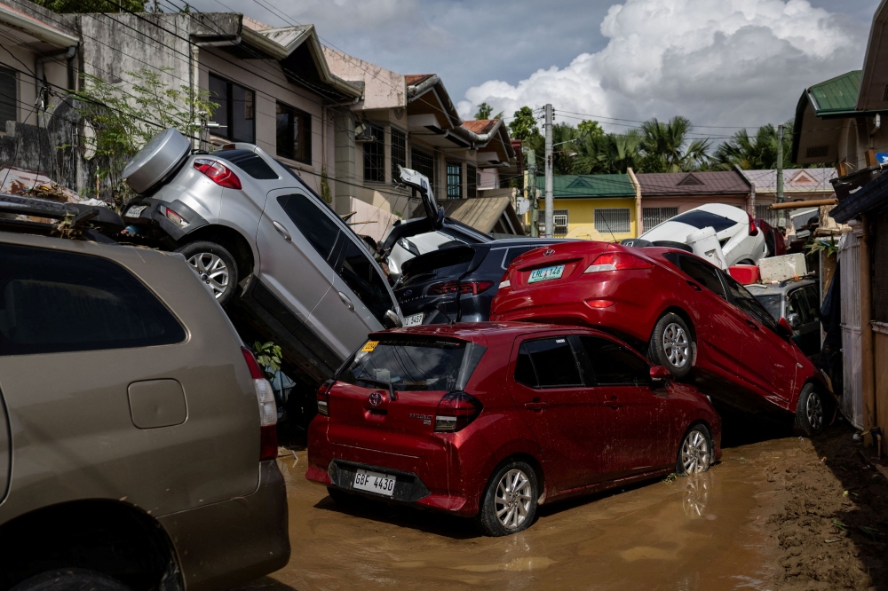 Cars swept away after heavy flooding brought on by Typhoon Kalmaegi are piled up at a subdivision in Bacayan, Cebu City, Philippines, November 5, 2025. — Reuters pic