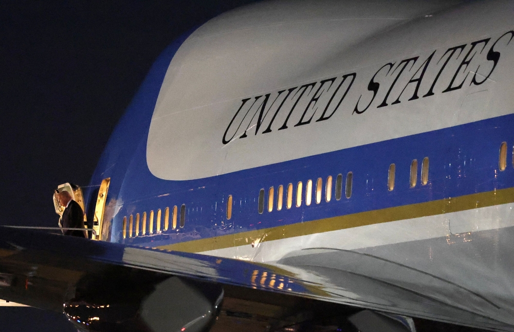 US President Donald Trump steps from Air Force One upon his return to Washington at Joint Base Andrews in Maryland November 5, 2025. Seven people briefly felt ill after a suspicious package was opened on Thursday at the military base near the US capital that is home to Air Force One, the presidential jet, a base spokesperson said yesterday. — Reuters pic 