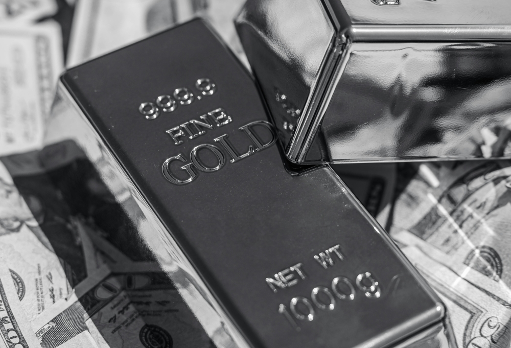 Hundreds of millions in cash and assets, including gold bars were seized in the money laundering investigation. — Pexels pic