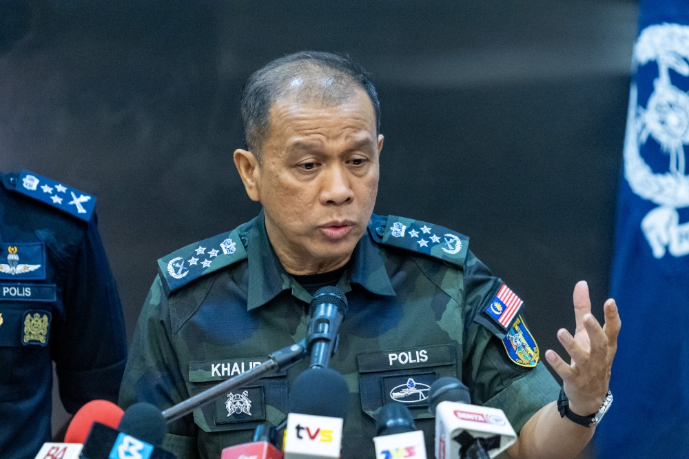 Inspector-General of Police Datuk Seri Mohd Khalid Ismail said preparations for the 17th Sabah state election include measures to handle the ongoing northeast monsoon, with over 9,000 officers ready for duty. —Picture by Firdaus Latif