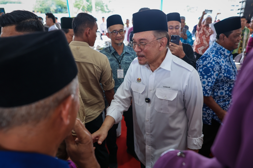 Prime Minister Datuk Seri Anwar Ibrahim attends the launch of the Masjid Madani Arowana Permatang Pauh development project in Permatang Pauh today. — Bernama pic