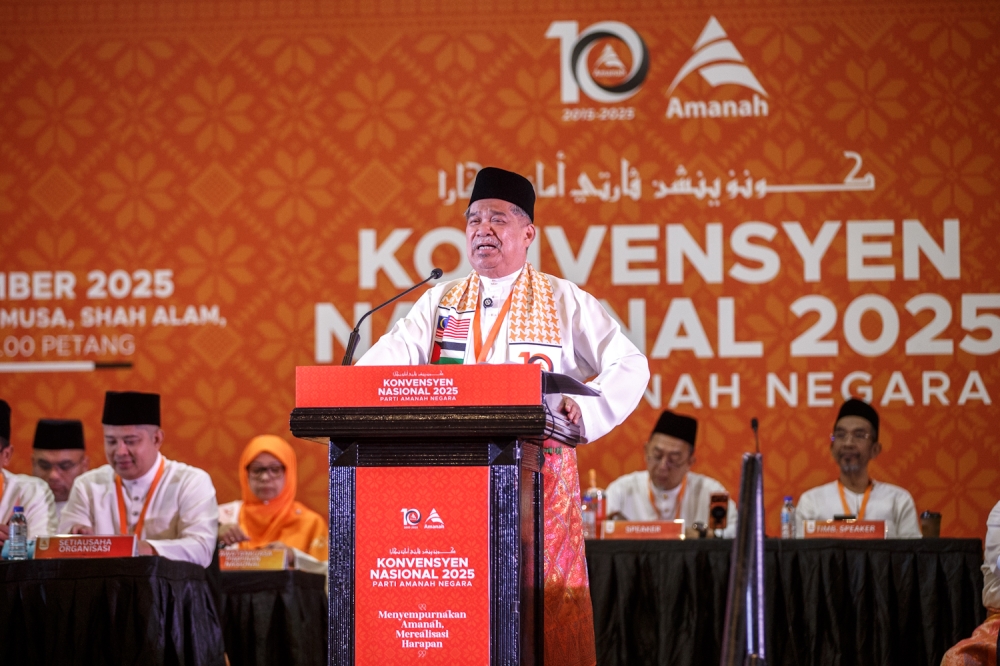 Amanah president Datuk Seri Mohammad Sabu delivers his speech during the Amanah National Convention in Shah Alam November 8, 2025. — Picture by Raymond Manuel