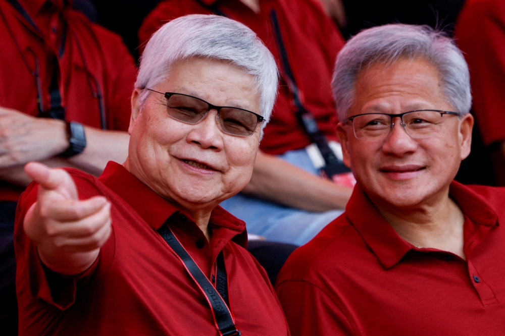 TSMC CEO CC Wei and Nvidia CEO Jensen Huang interact on stage during TSMC’s annual sports day in Hsinchu, Taiwan November 8, 2025. — Reuters pic