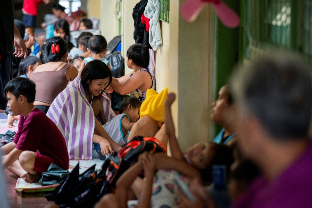 Residents take shelter at an evacuation center as they prepare for Super Typhoon Fung-Wong, Manila, Philippines, November 9, 2025. — Reuters pic